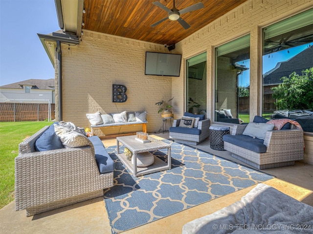 view of patio / terrace featuring an outdoor living space and ceiling fan