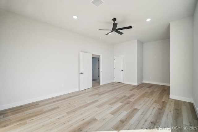 unfurnished room featuring baseboards, recessed lighting, visible vents, and light wood-style floors