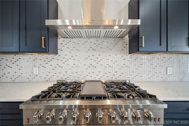 kitchen featuring ventilation hood, light stone countertops, stainless steel stove, and tasteful backsplash