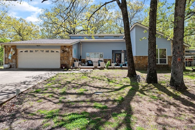 view of front of home with a garage