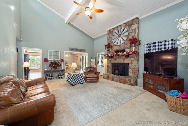 living room with carpet, a wood stove, high vaulted ceiling, and ornamental molding