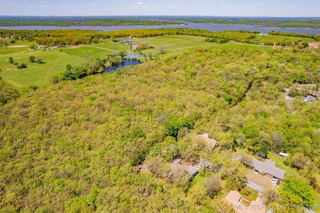 drone / aerial view with a rural view and a water view