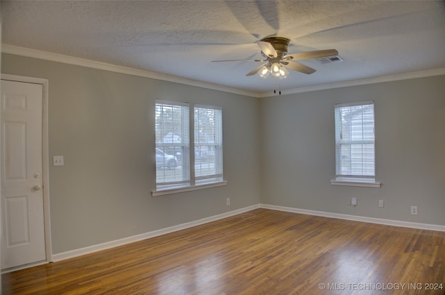 spare room with hardwood / wood-style flooring, ceiling fan, crown molding, and a textured ceiling