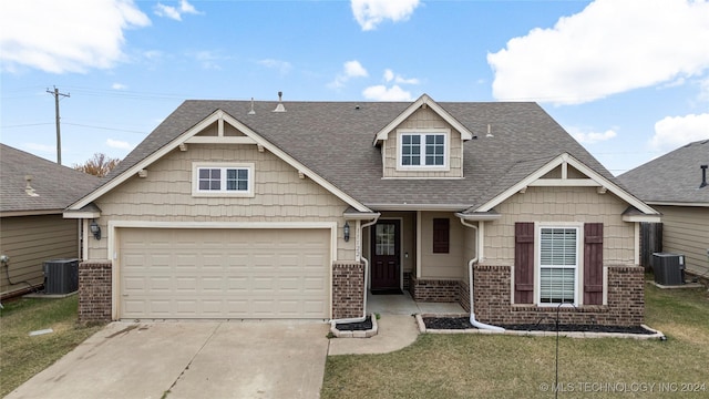 craftsman-style house with a front lawn and central AC