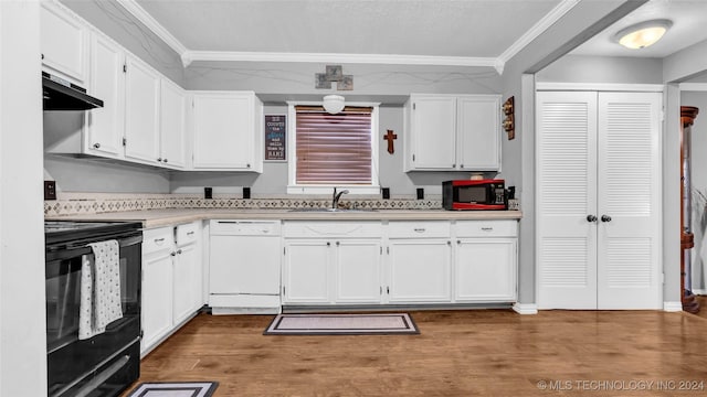 kitchen featuring white cabinetry, crown molding, hardwood / wood-style floors, extractor fan, and black appliances