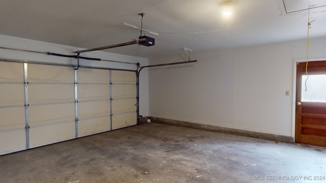 garage featuring a garage door opener