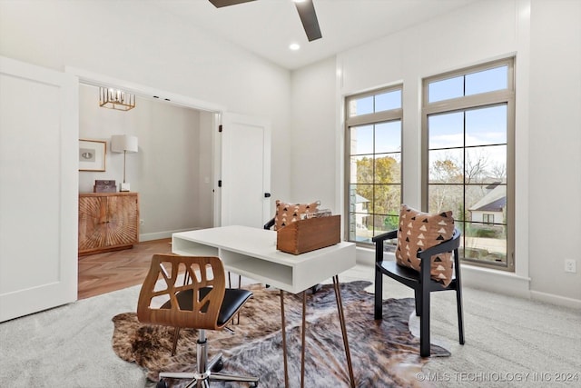 office space featuring ceiling fan and light parquet floors