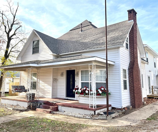 view of front of home featuring covered porch