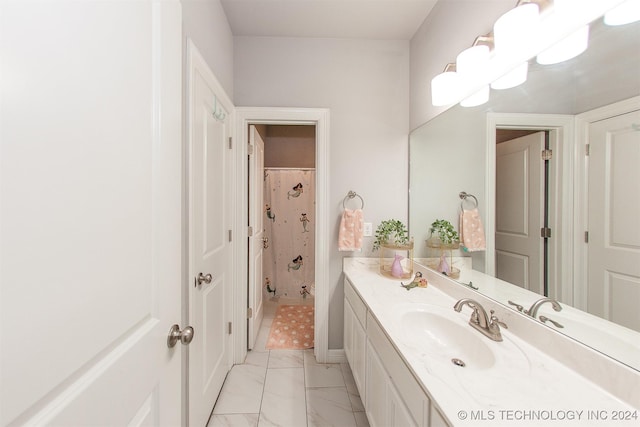 bathroom with a shower with curtain and vanity