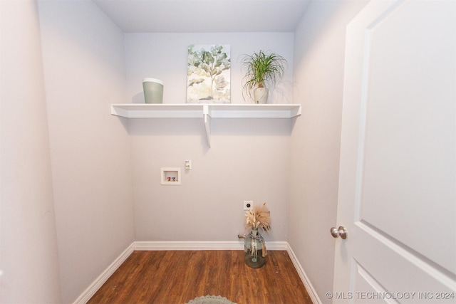 clothes washing area with dark hardwood / wood-style flooring, washer hookup, and hookup for an electric dryer