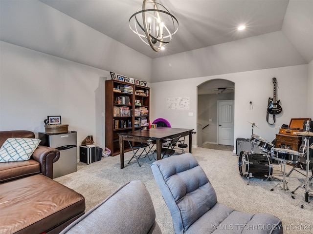 carpeted living room featuring ceiling fan with notable chandelier