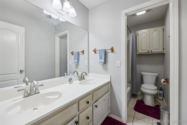 full bathroom with tile patterned floors, vanity, toilet, and shower / bathtub combination with curtain