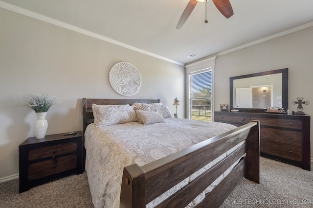 bedroom with ceiling fan, light colored carpet, and ornamental molding