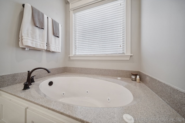 bathroom with a washtub