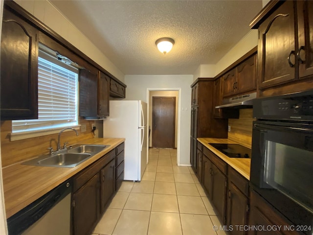 kitchen with black appliances, dark brown cabinets, sink, and a textured ceiling