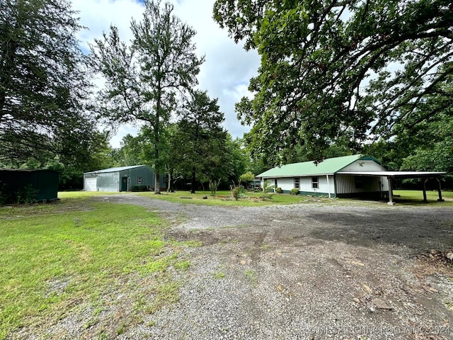 view of yard featuring a carport