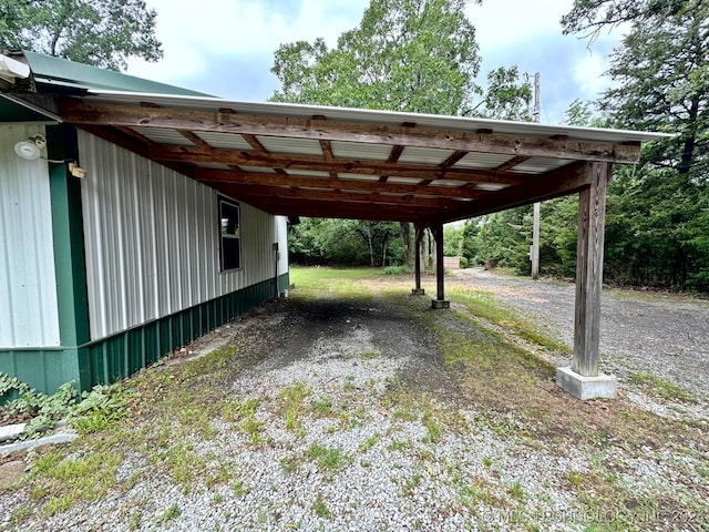 view of parking with a carport