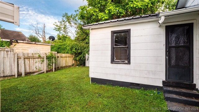 view of home's exterior featuring a yard