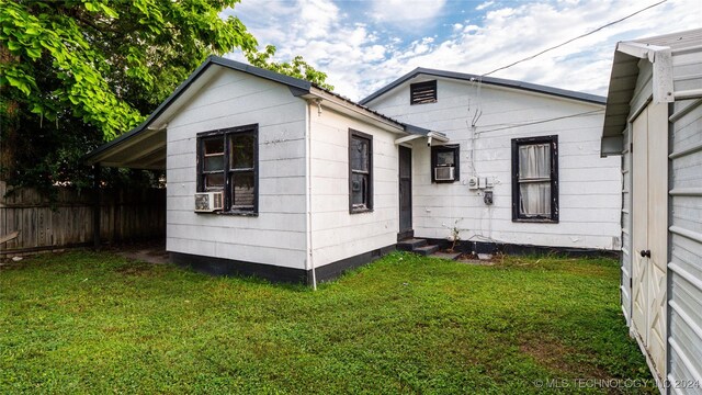 exterior space with a lawn