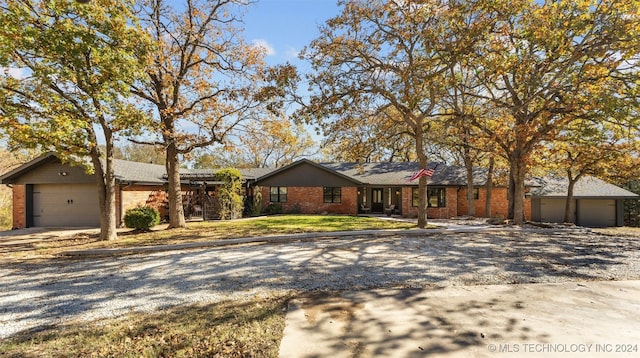 single story home with a garage