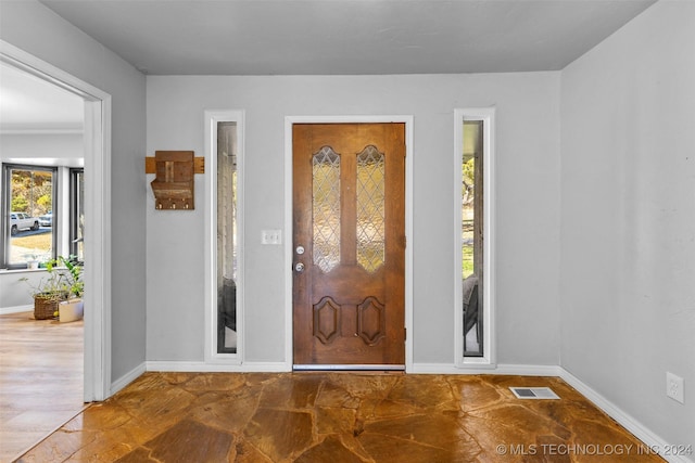 entrance foyer featuring hardwood / wood-style flooring