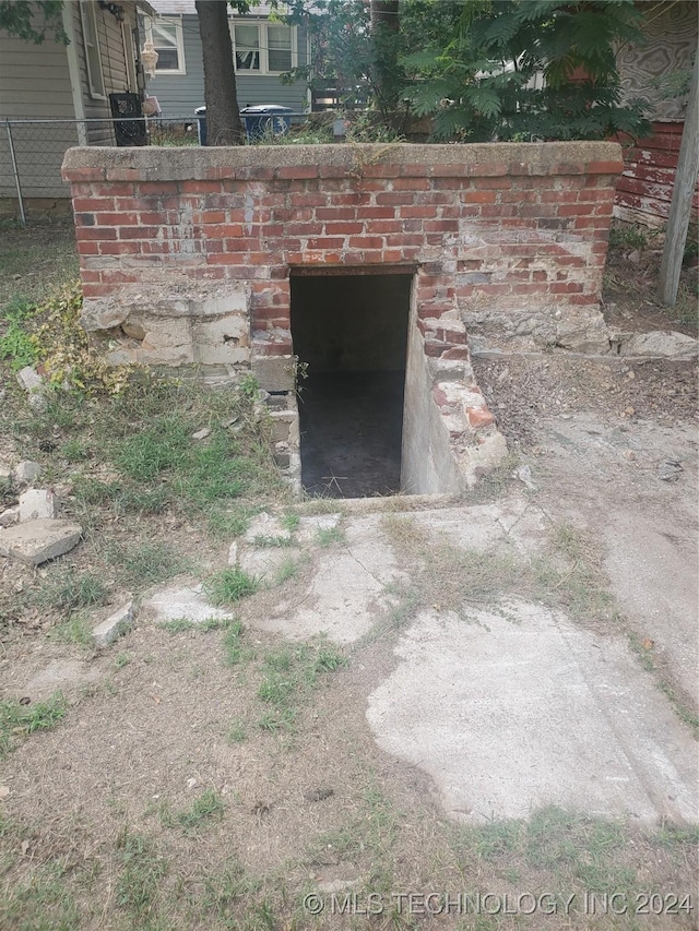 view of entry to storm shelter