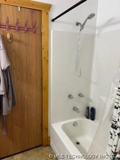 bathroom featuring shower / bath combination