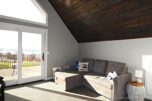 carpeted living room featuring wood ceiling and vaulted ceiling