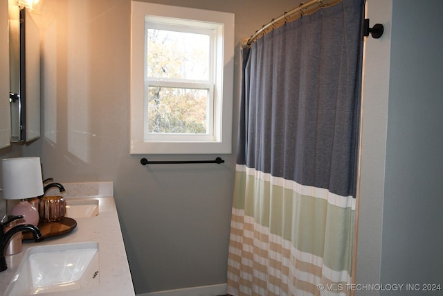 bathroom featuring vanity