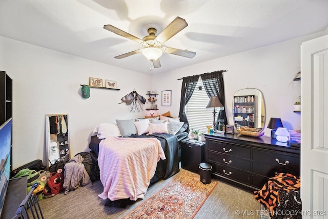 bedroom featuring ceiling fan