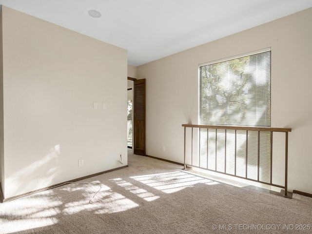 empty room with light carpet