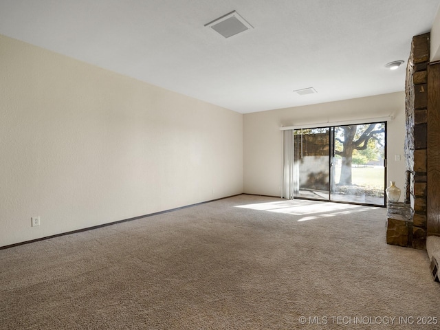 unfurnished room featuring carpet floors