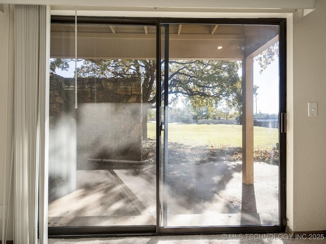 entryway with a water view