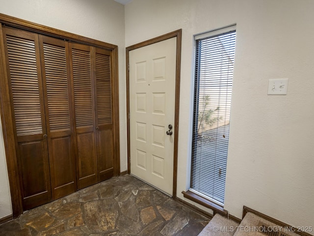 entryway with stone finish flooring