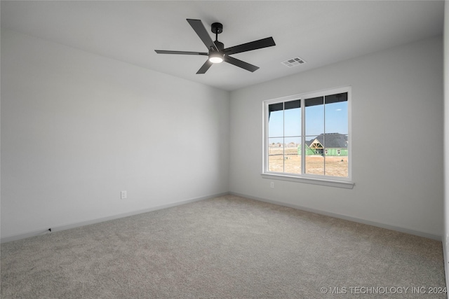 unfurnished room featuring carpet flooring and ceiling fan