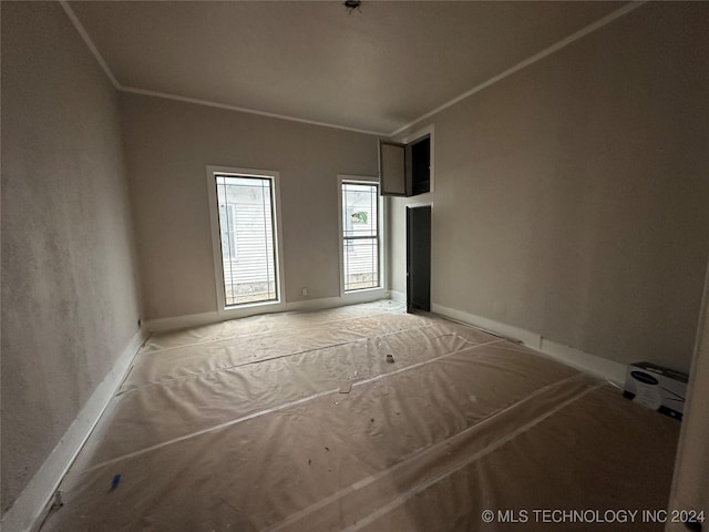 empty room with crown molding