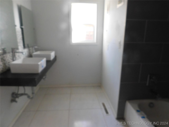 bathroom featuring a bathing tub and sink