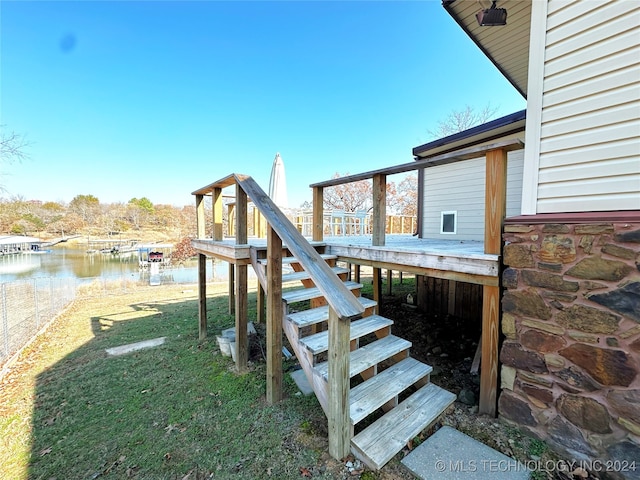 exterior space with a water view