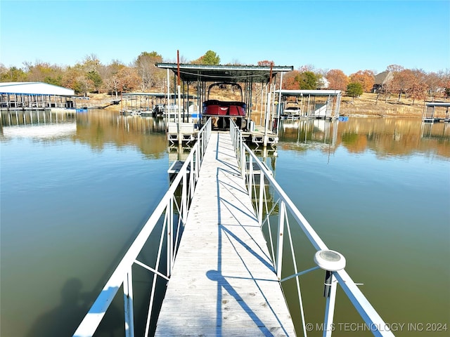 view of dock with a water view