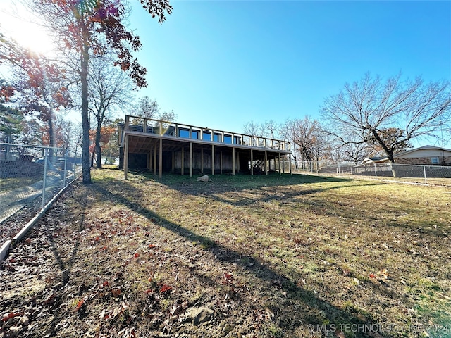 view of yard with a wooden deck