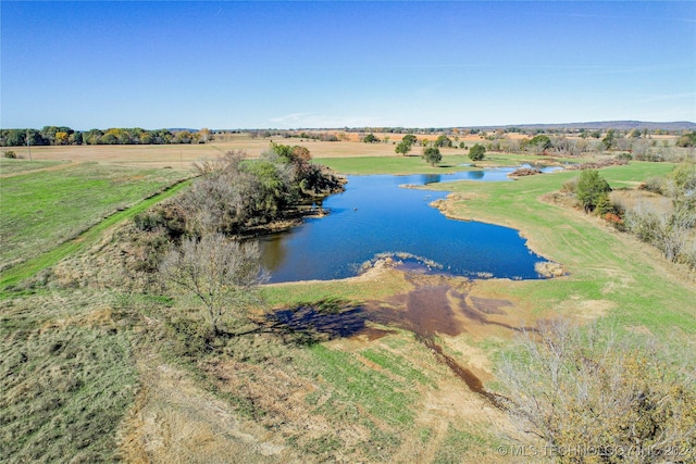 aerial view featuring a rural view and a water view