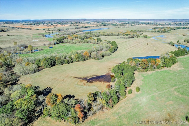 bird's eye view featuring a rural view and a water view