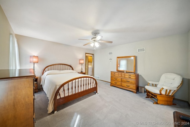 bedroom featuring ceiling fan and light colored carpet