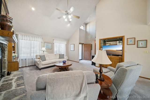 living room with carpet floors, a fireplace, and high vaulted ceiling