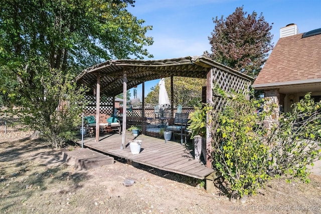 exterior space featuring a wooden deck