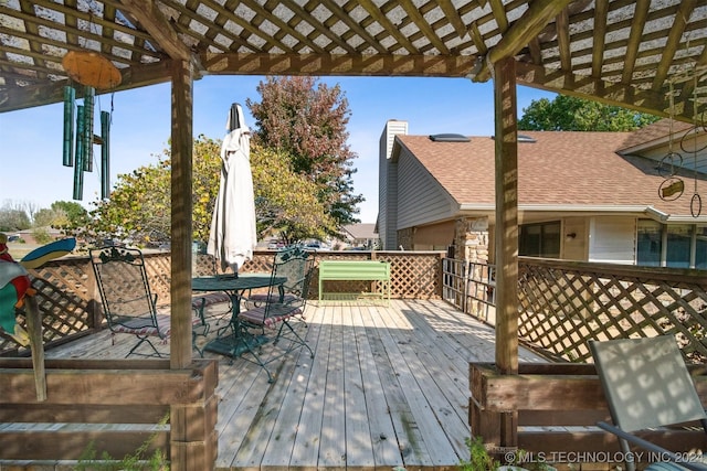 wooden deck with a pergola