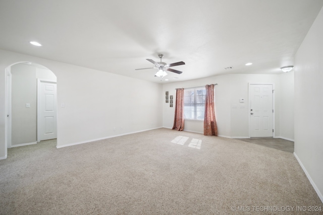 empty room with light carpet and ceiling fan