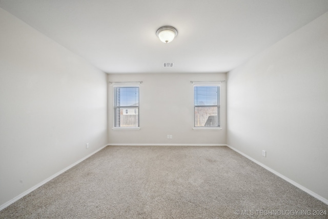 view of carpeted spare room