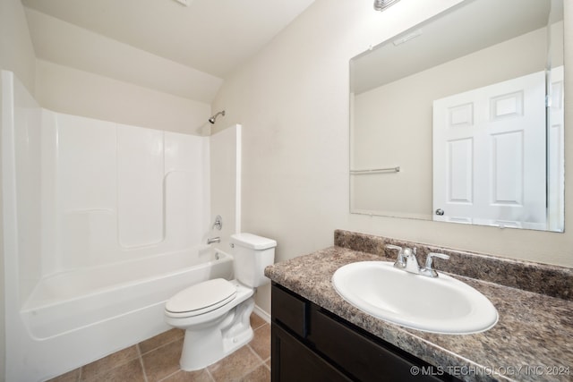 full bathroom featuring tile patterned floors, tub / shower combination, vanity, toilet, and lofted ceiling