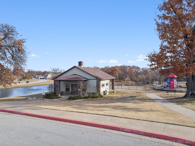 bungalow featuring a water view